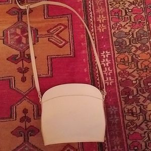 Elegant Longchamp cream handbag